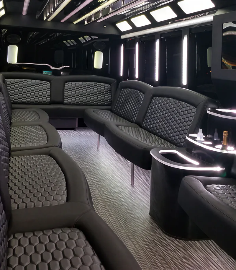 Wraparound leather interior of a Temecula party bus